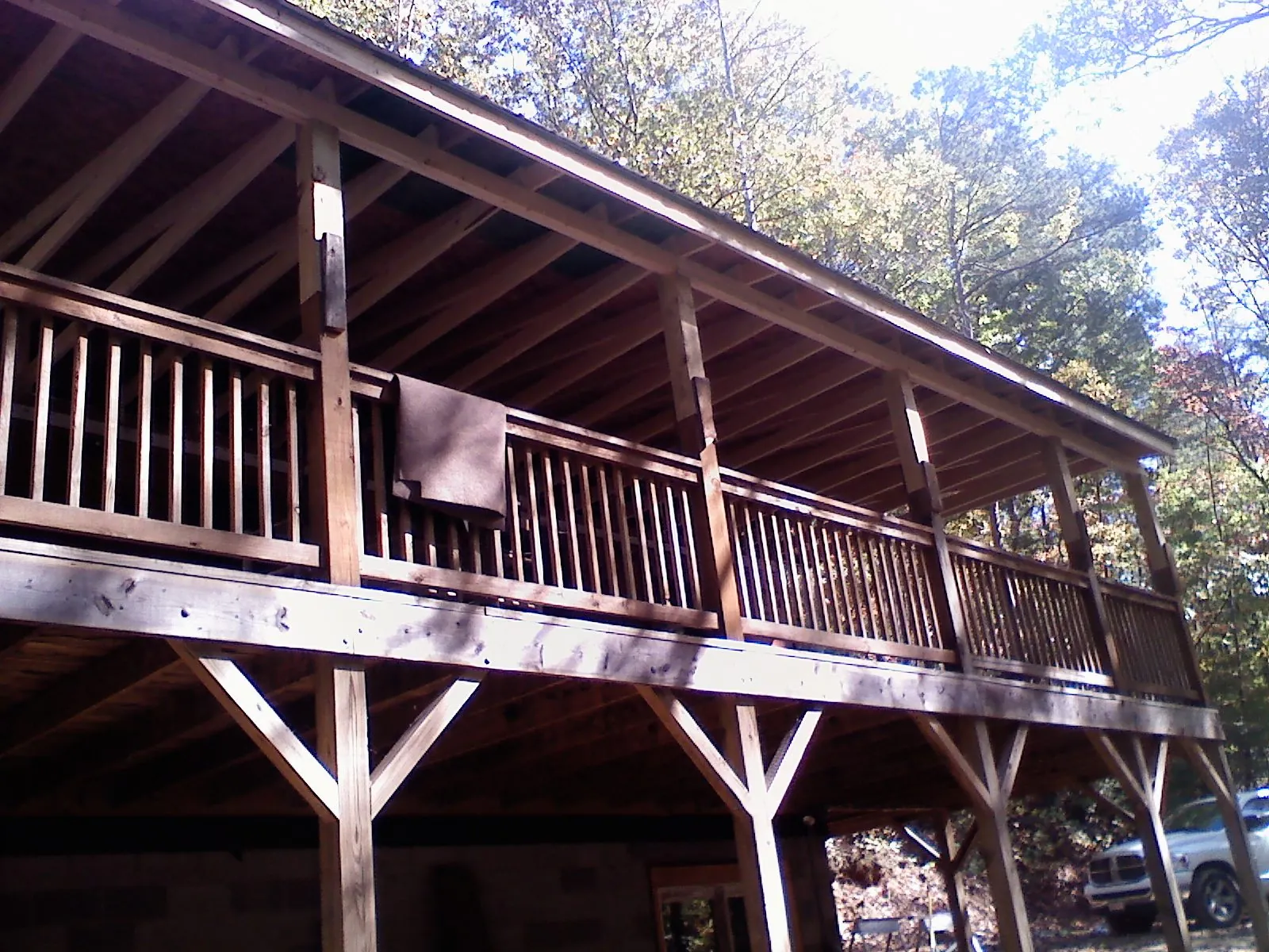 Timber framing under a new elevated porch and deck — Roof Leak Repair in Plympton by Roofing Brothers
